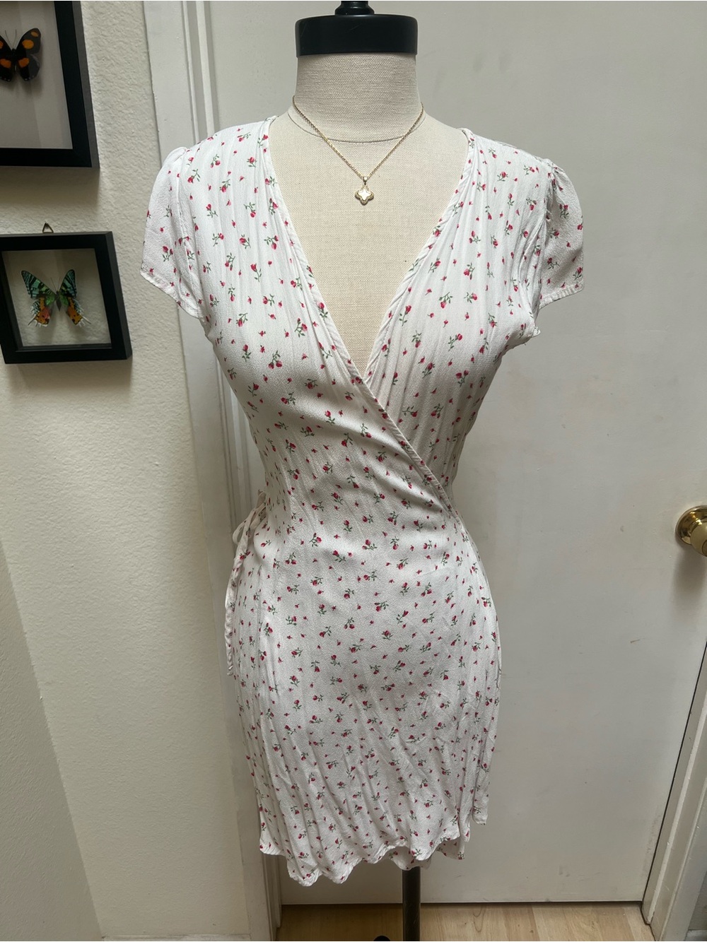 White wrap around brandy Melville dress. Fair condition with some damage